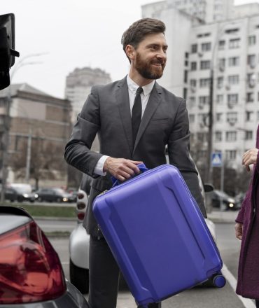 taxi-driver-female-client-interacting-formal-way-min